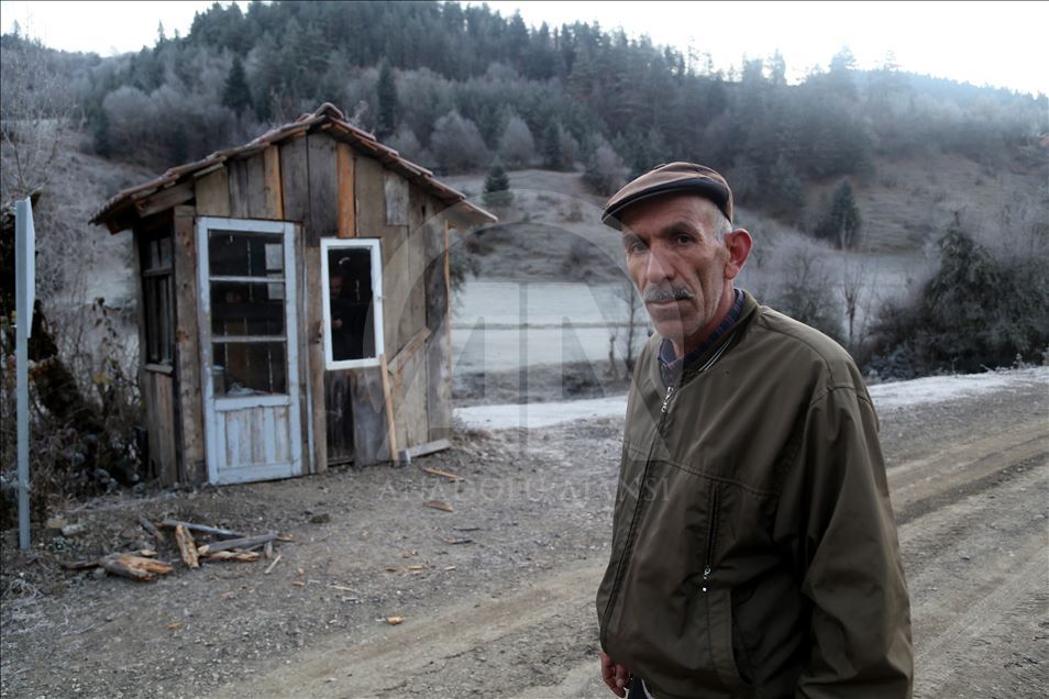 A local man heats the shack for students every morning in Turkey