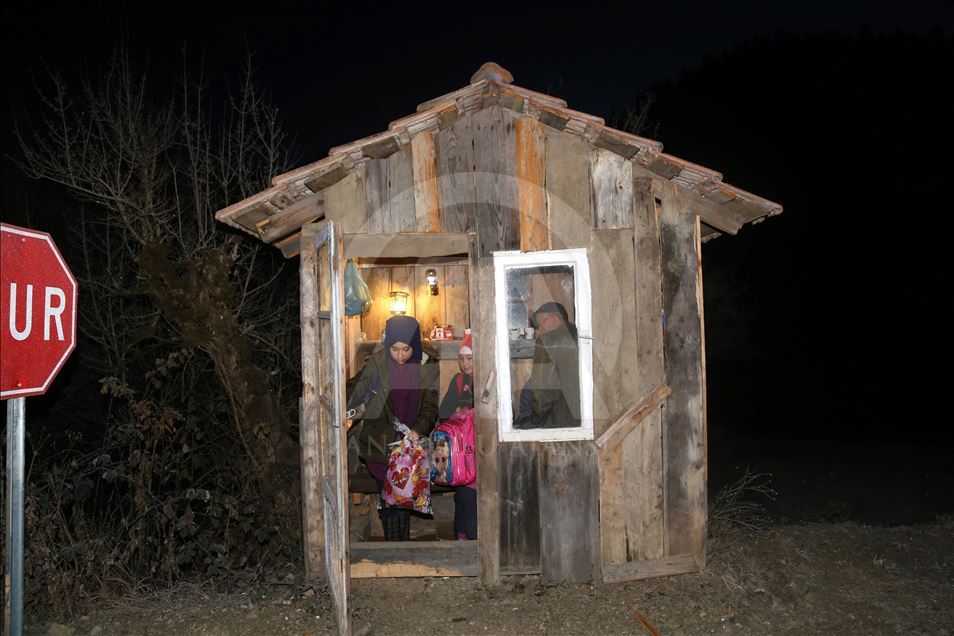 A local man heats the shack for students every morning in Turkey
