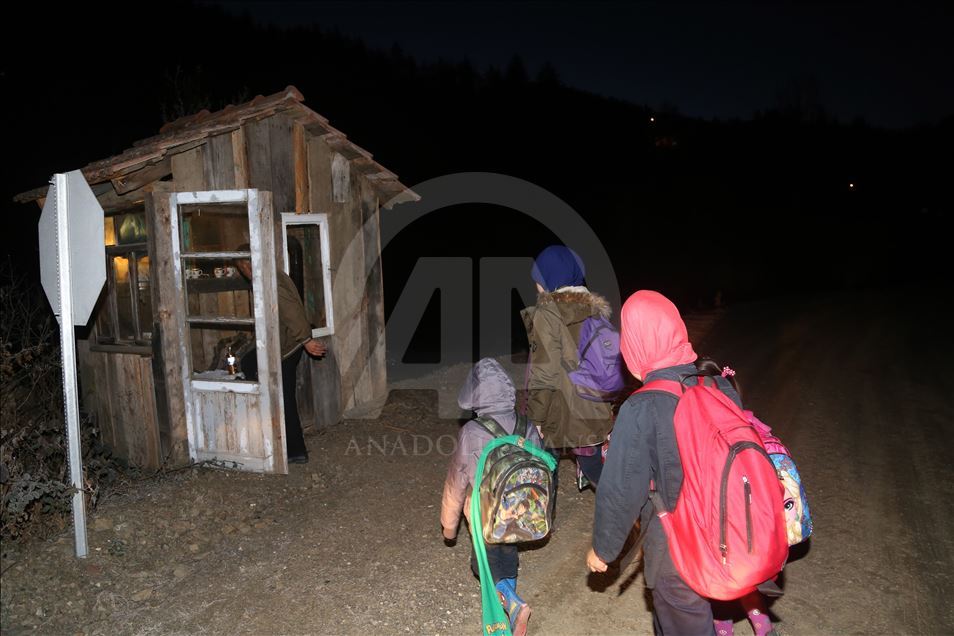 A local man heats the shack for students every morning in Turkey