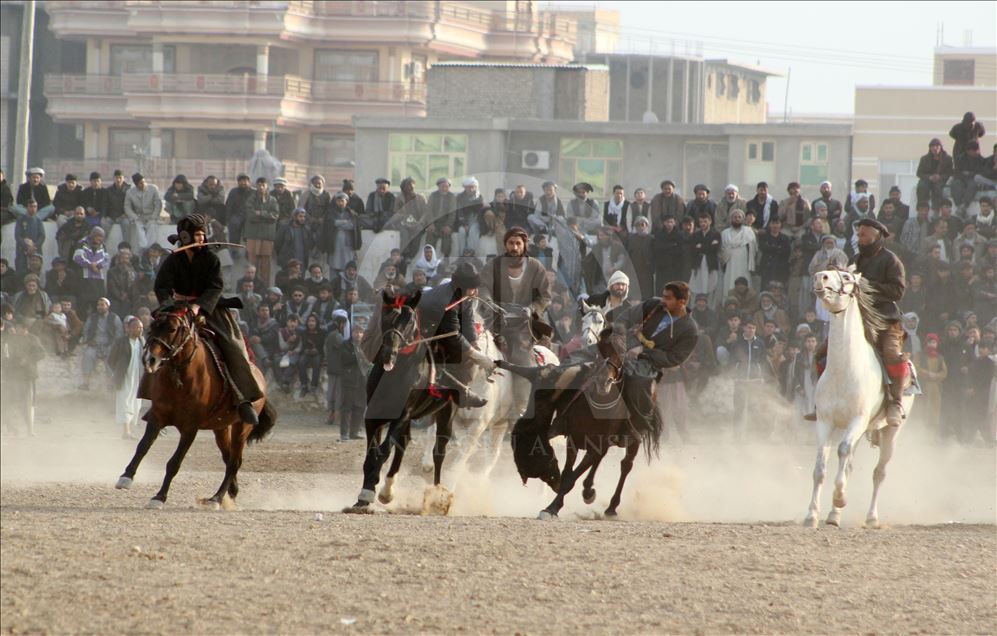 Afghan horsemen play Buzkashi