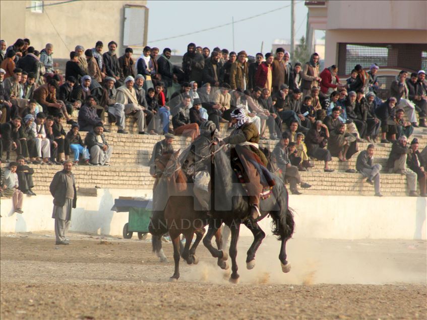 Afghan horsemen play Buzkashi