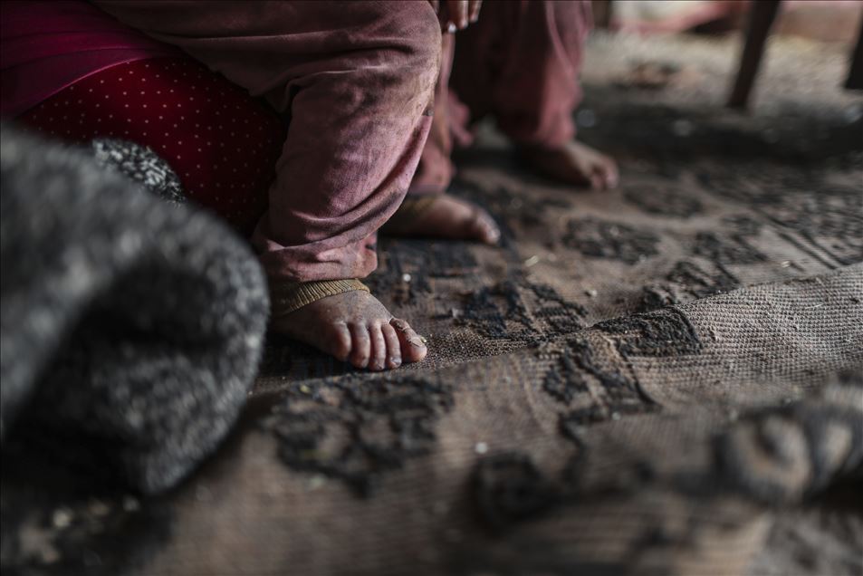 Syrian young mother of 5 children in Idlib's camp