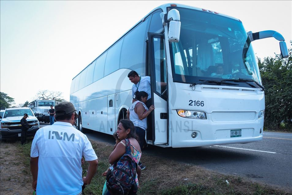 Migrants try to cross the border between Mexico and Guatemala