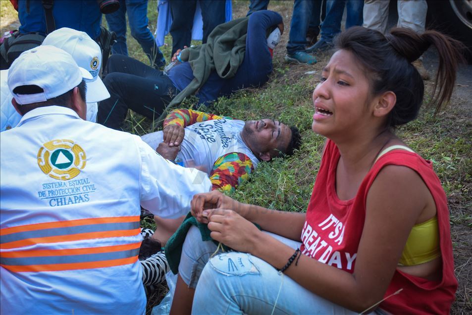 Migrants try to cross the border between Mexico and Guatemala