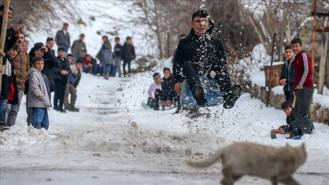 Children enjoying snow in Turkey's Van