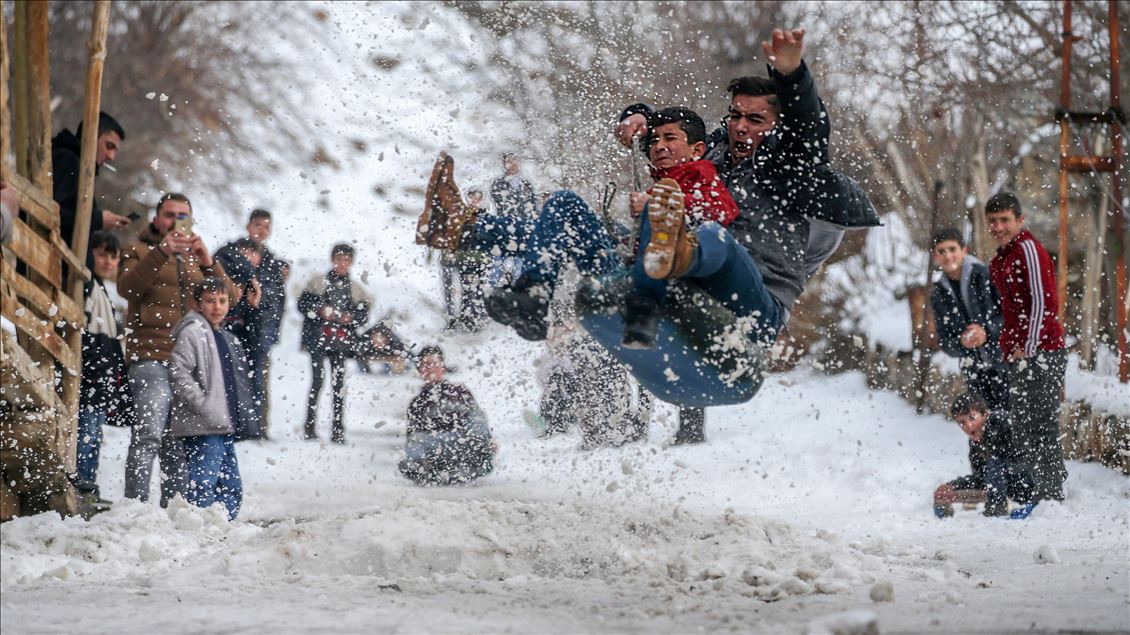 Children enjoying snow in Turkey's Van