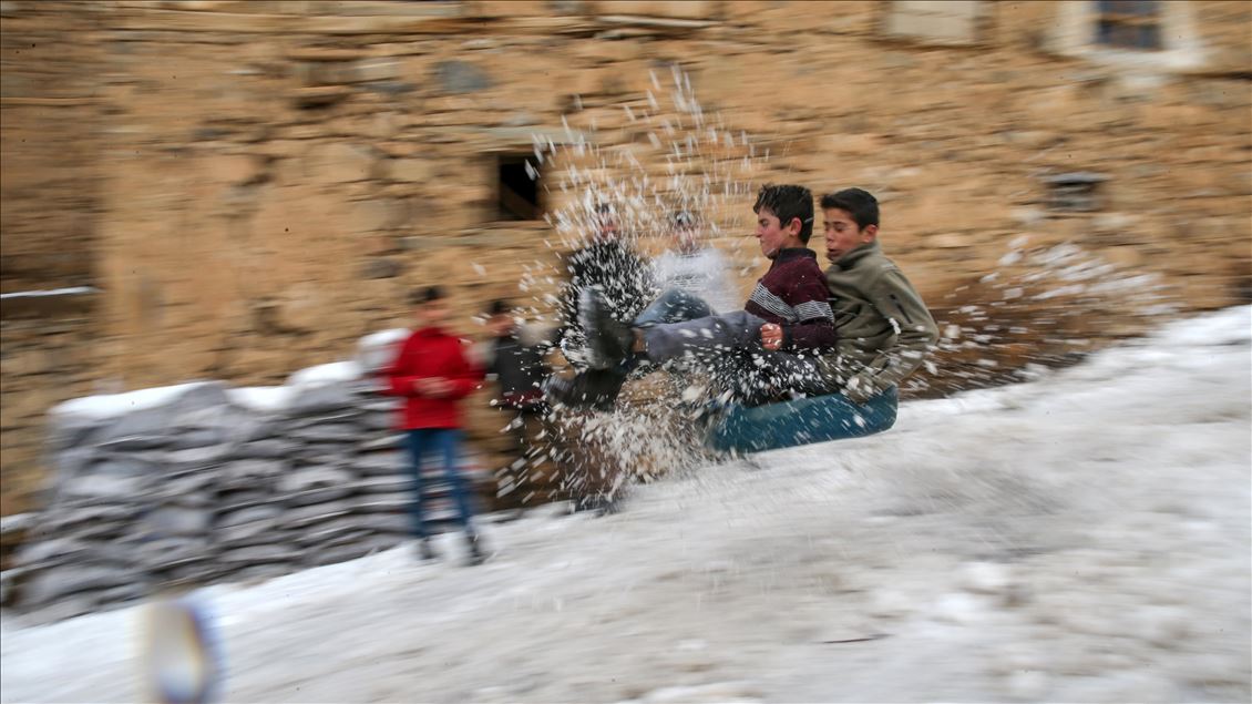 Children enjoying snow in Turkey's Van