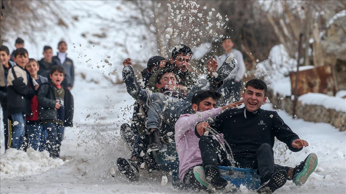 Children enjoying snow in Turkey's Van
