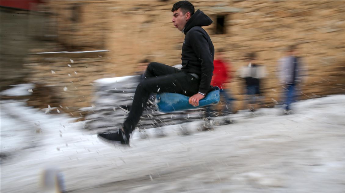 Children enjoying snow in Turkey's Van