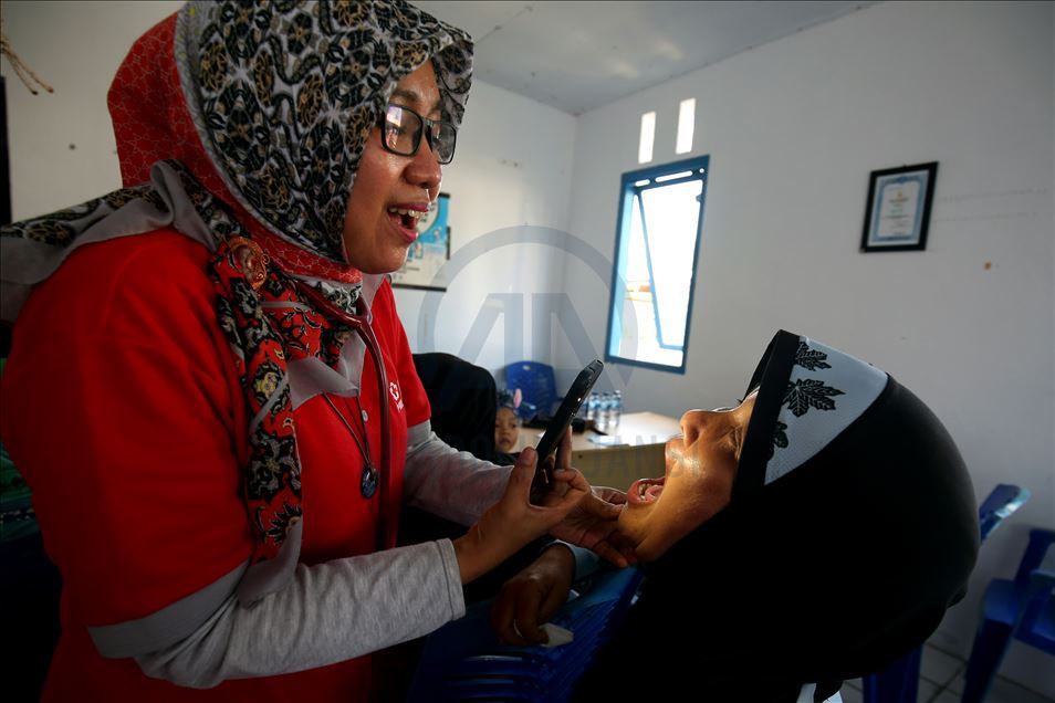 Sosialisi virus korona kepada warga di sekitar pusat observasi WNI, dari Wuha