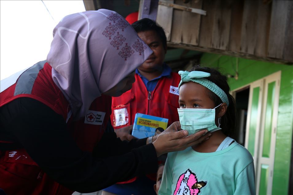 Sosialisi virus korona kepada warga di sekitar pusat observasi WNI, dari Wuha