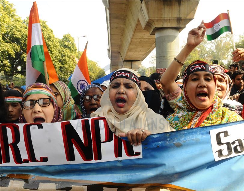 NEW DELHI, INDIA - FEBRUARY 10 : Jamia Students and local residents hold placards and raise slogans during a protest against the Citizenship AmendmentAct (CAA) and National Register of Citizens (NRC), at Jamia Millia Islamia University in New Delhi, Ind