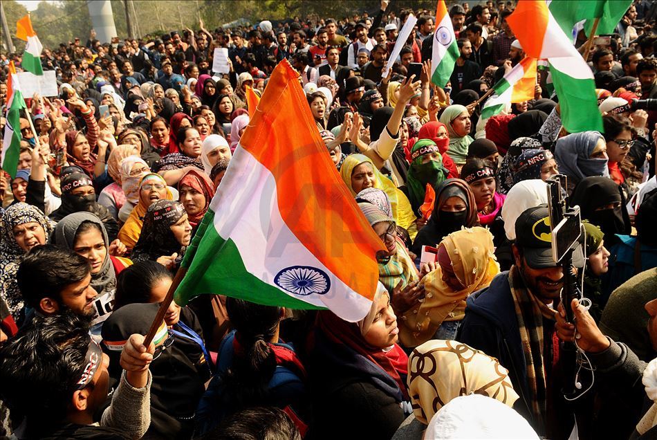 NEW DELHI, INDIA - FEBRUARY 10 : Jamia Students and local residents hold placards and raise slogans during a protest against the Citizenship AmendmentAct (CAA) and National Register of Citizens (NRC), at Jamia Millia Islamia University in New Delhi, Ind