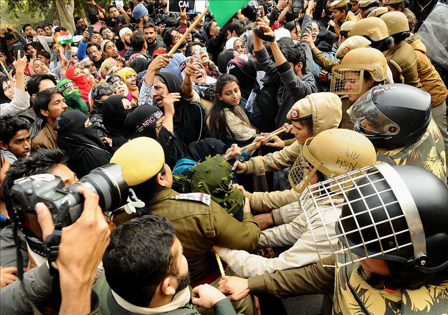 NEW DELHI, INDIA - FEBRUARY 10 : Jamia Students and local residents hold placards and raise slogans during a protest against the Citizenship AmendmentAct (CAA) and National Register of Citizens (NRC), at Jamia Millia Islamia University in New Delhi, Ind