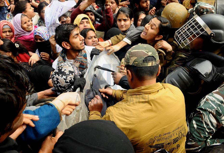 NEW DELHI, INDIA - FEBRUARY 10 : Jamia Students and local residents hold placards and raise slogans during a protest against the Citizenship AmendmentAct (CAA) and National Register of Citizens (NRC), at Jamia Millia Islamia University in New Delhi, Ind