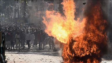 Clashes between a group of anti-CAA protesters and CAA supporters