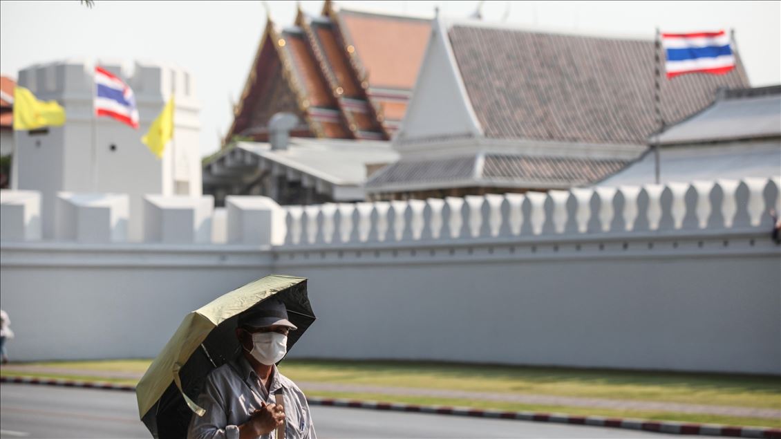 Thai people and tourist with medical mask within precautions against coronavirus in Bangkok metropolitan