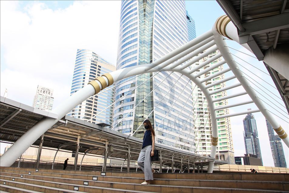 Thai people and tourist with medical mask within precautions against coronavirus in Bangkok metropolitan