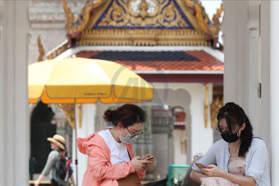 Thai people and tourist with medical mask within precautions against coronavirus in Bangkok metropolitan