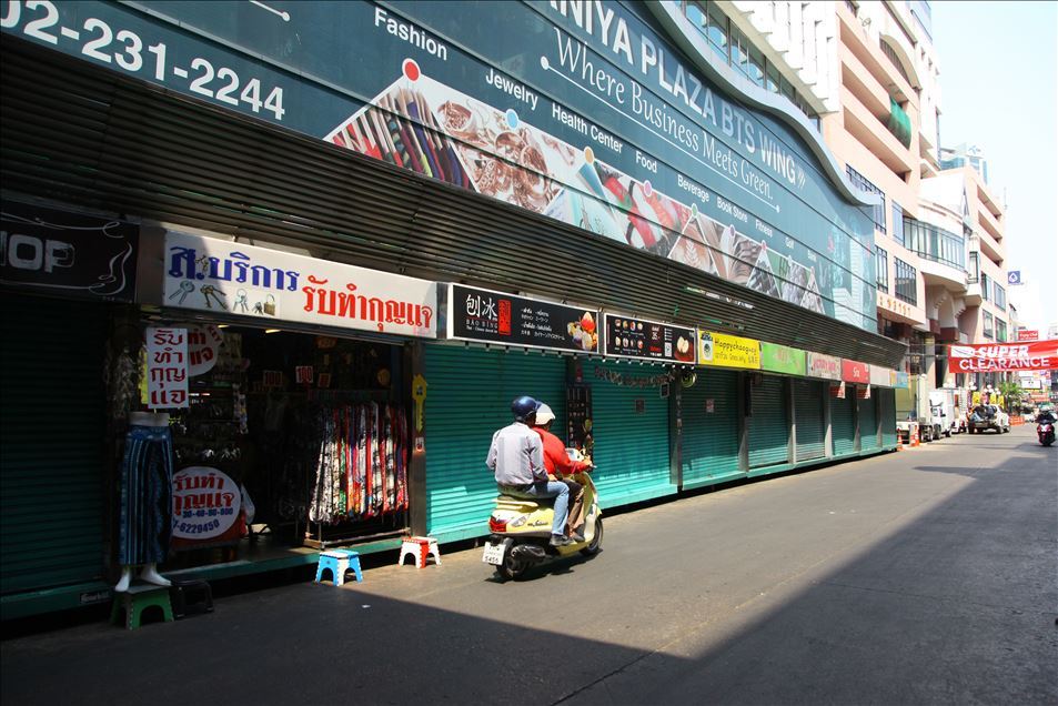Thai people and tourist with medical mask within precautions against coronavirus in Bangkok metropolitan