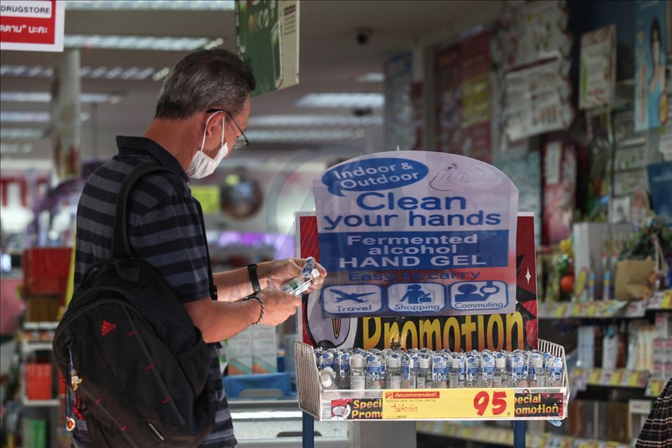 Thai people and tourist with medical mask within precautions against coronavirus in Bangkok metropolitan