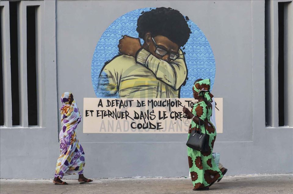 Los graffiteros senegaleses luchan contra el coronavirus con sus aerosoles