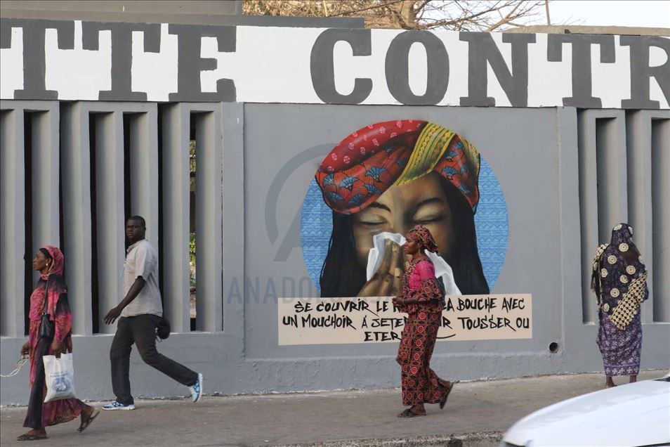 Los graffiteros senegaleses luchan contra el coronavirus con sus aerosoles