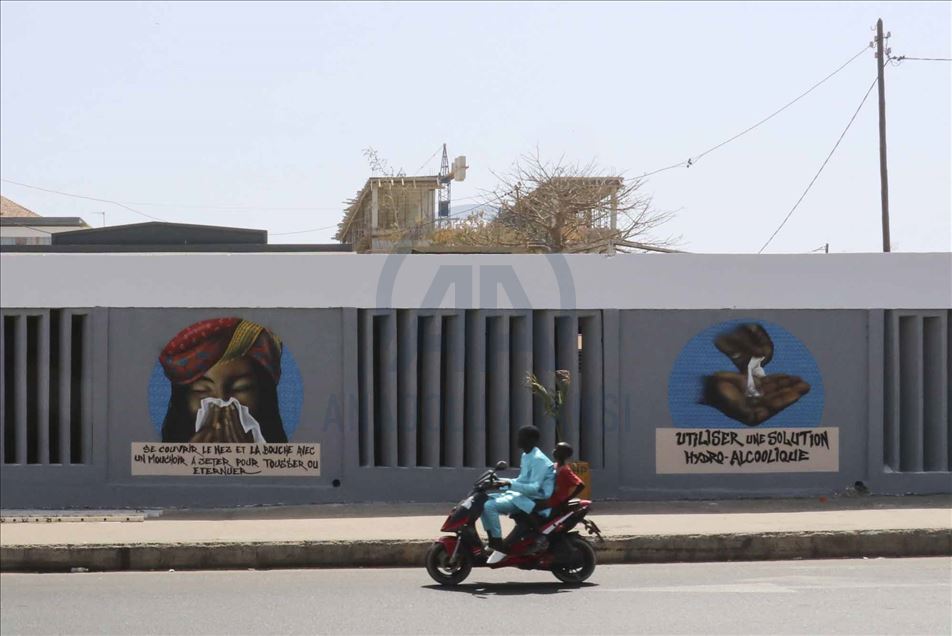 Los graffiteros senegaleses luchan contra el coronavirus con sus aerosoles