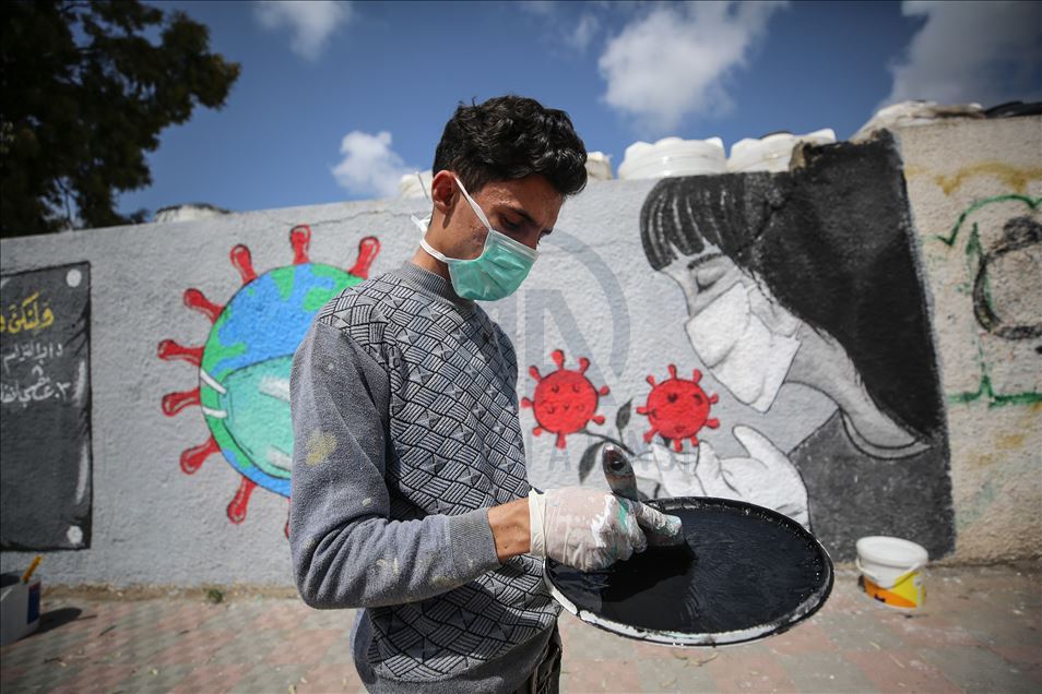 Filistinli ressamlar grafitiyle koronavirüs salgınına dikkati çekti