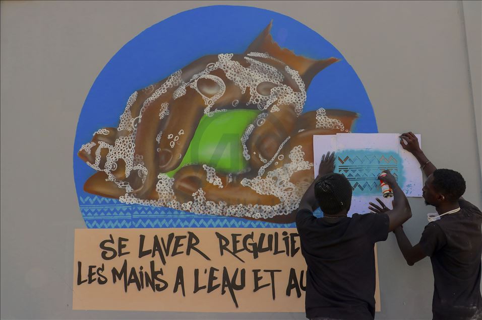 بالغرافيتي.. فنانون سنغاليون يساهمون بالتوعية ضد "كورونا"
