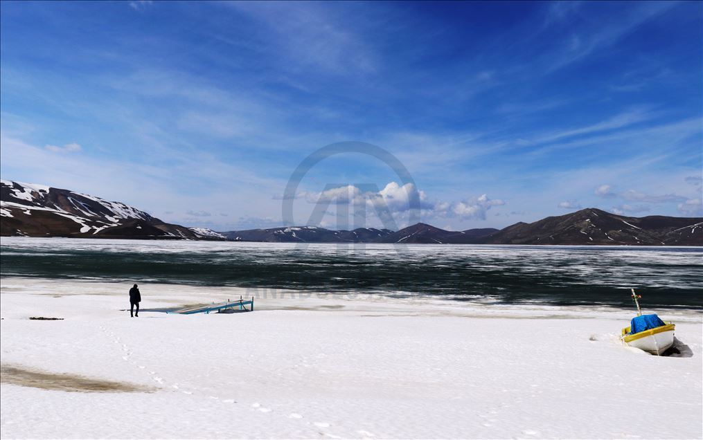 Ice covered surface of Lake Balik started to melt