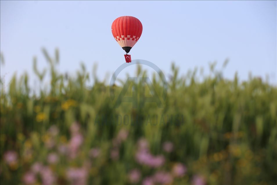Turkey's domestic and national hot air balloon flies with Ataturk's poster in Nevsehir
