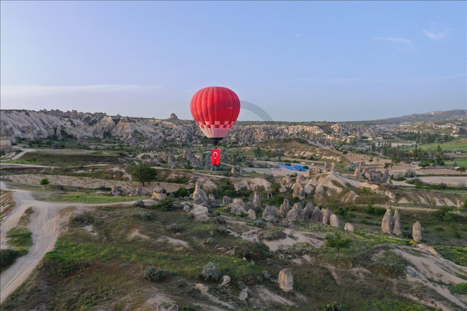 Turkey's domestic and national hot air balloon flies with Ataturk's poster in Nevsehir