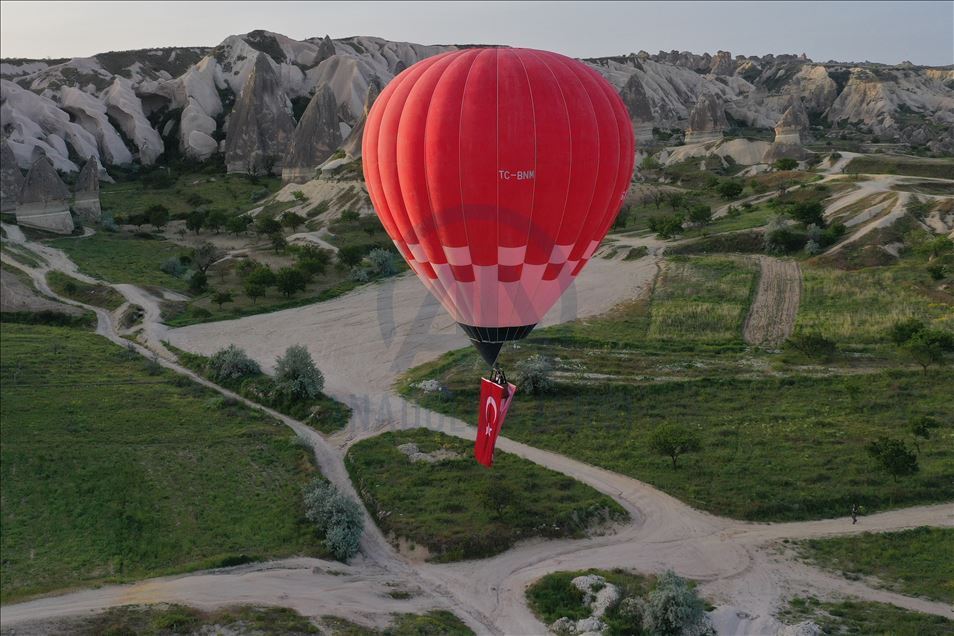 Turkey's domestic and national hot air balloon flies with Ataturk's poster in Nevsehir