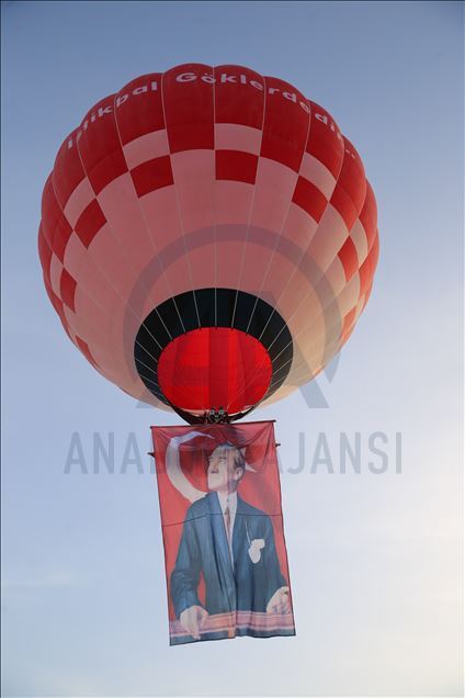Turkey's domestic and national hot air balloon flies with Ataturk's poster in Nevsehir