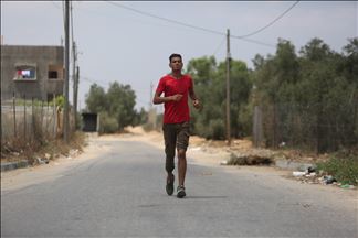 Atleta palestino se recupera de las heridas en las manifestaciones por la Gran Marcha del Retorno y reinicia entrenamientos durante la pandemia