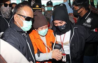 Maria Pauline Lumowa, buronan dan tersangka pembobolan bank BNI Rp 1,7 triliun tiba di Indonesia