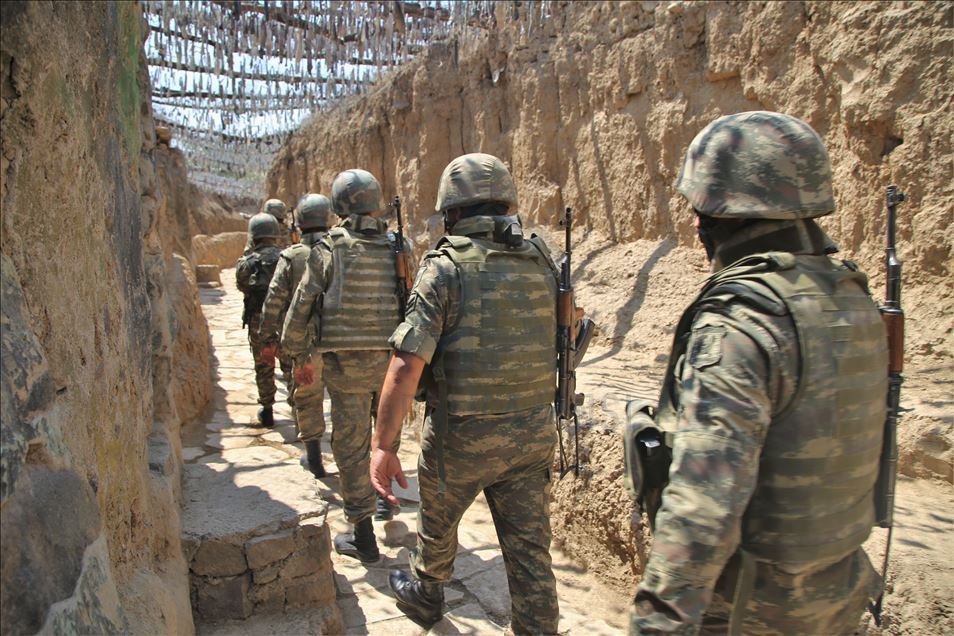 Azerbaijani soldiers patrol to respond to possible attacks in Azerbaijan's Tovuz