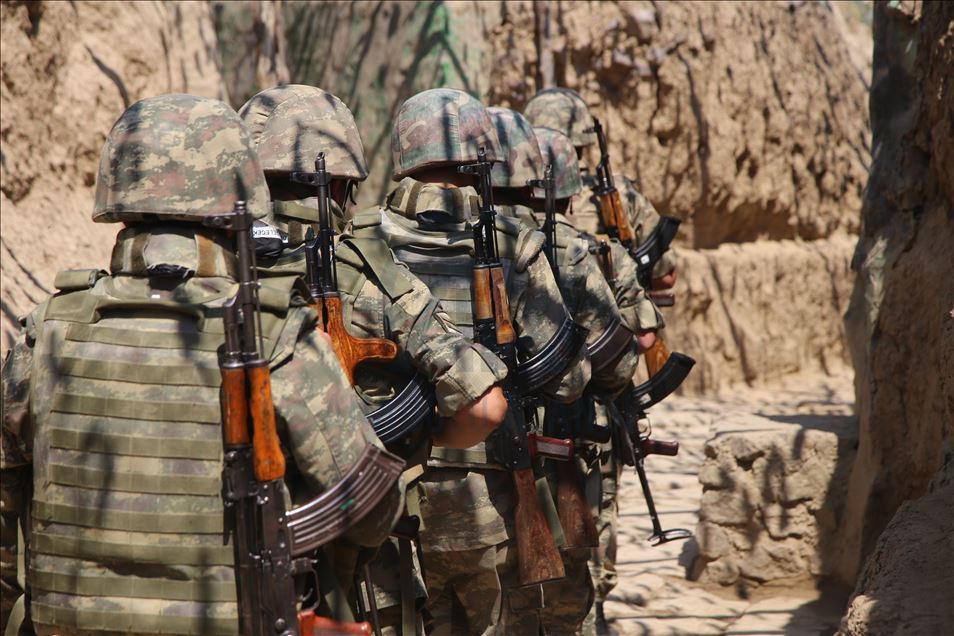 Azerbaijani soldiers patrol to respond to possible attacks in Azerbaijan's Tovuz