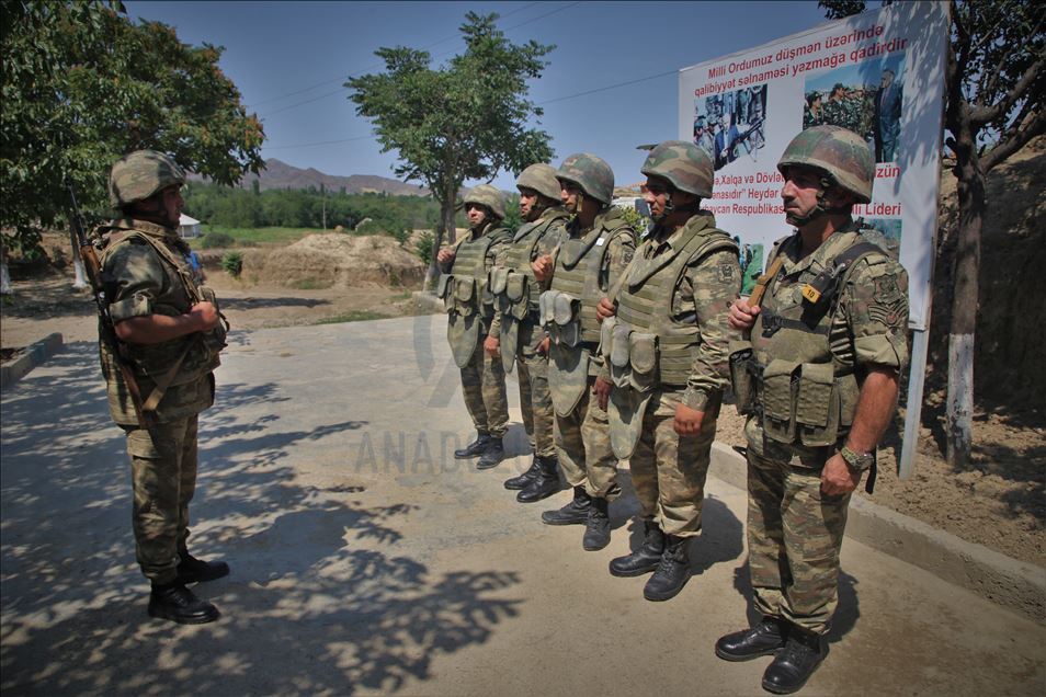 Azerbaijani soldiers patrol to respond to possible attacks in Azerbaijan's Tovuz