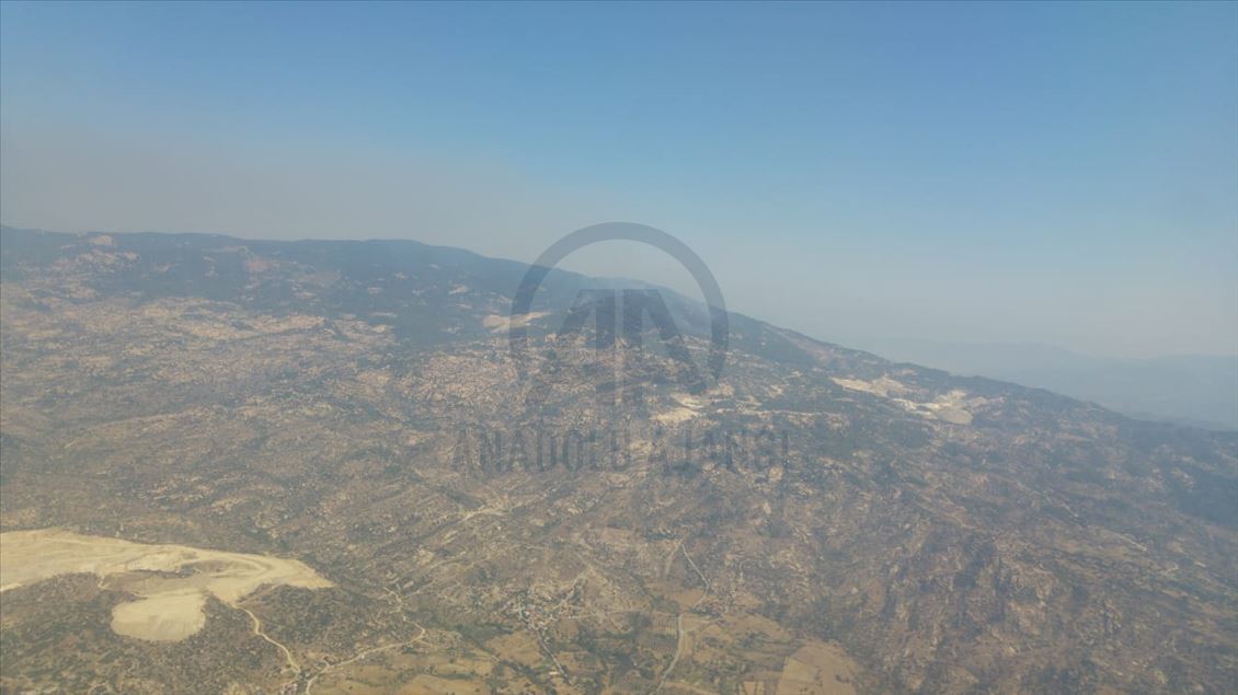 Aydın'da başlayıp Muğla'ya kadar ulaşan orman yangını kısmen kontrol altına alındı
