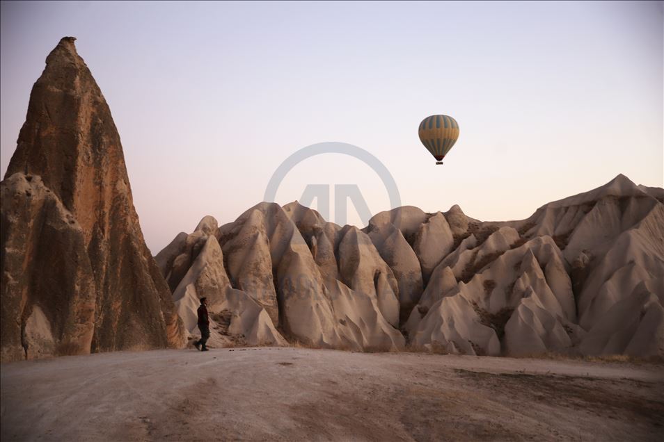 Tourists enjoy beauty of Cappadocia from hot air balloons