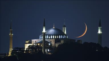 Stunning view of crescent moon above the Grand Hagia Sophia Grand mosqu