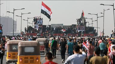 Iraklılar, 25 Ekim gösterilerinin birinci yılında Tahrir Meydanı'nda