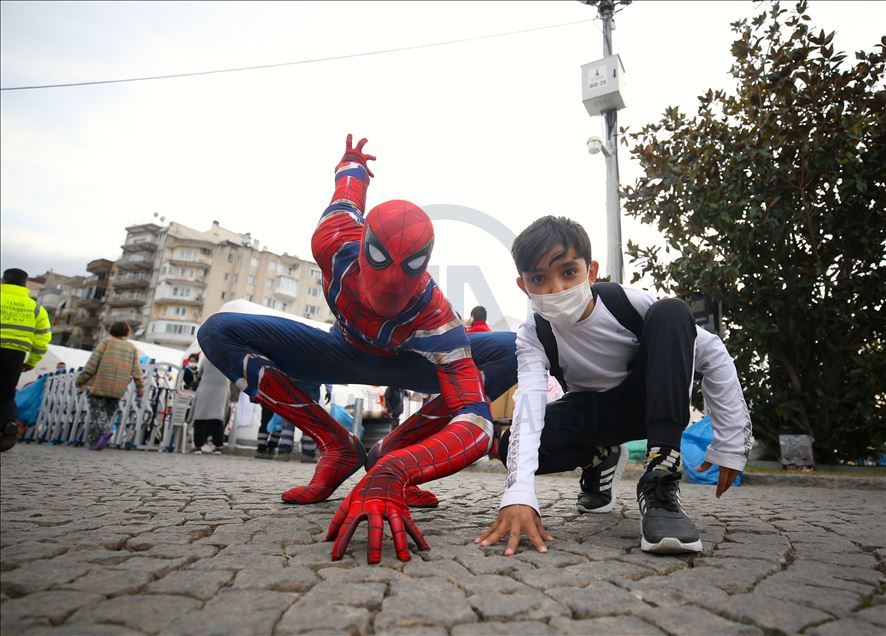 Burak Soylu with Spiderman costume visits earthquake victims in Izmir