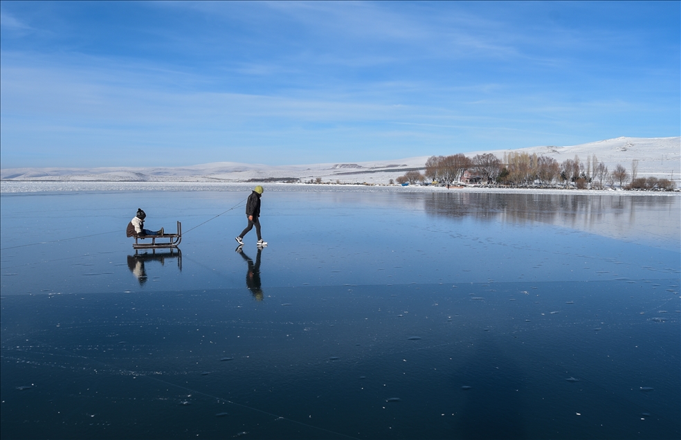 People enjoy winter at Lake Cildir