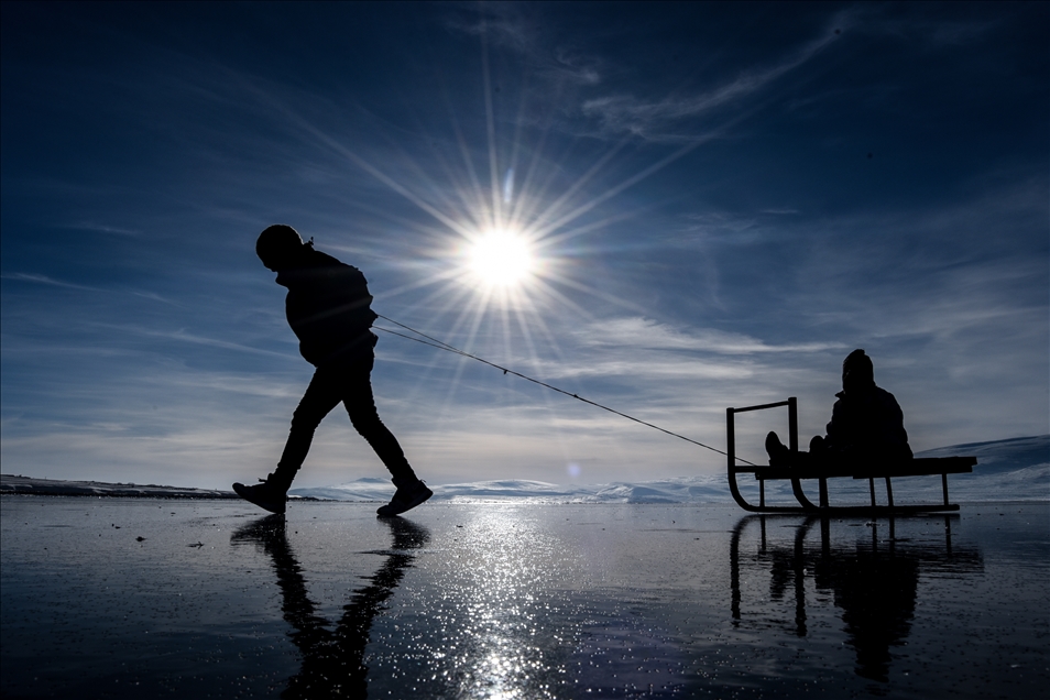 People enjoy winter at Lake Cildir