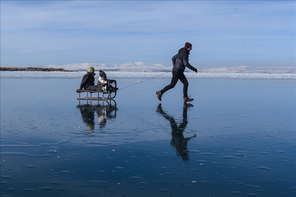 People enjoy winter at Lake Cildir