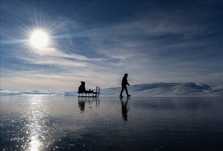 People enjoy winter at Lake Cildir