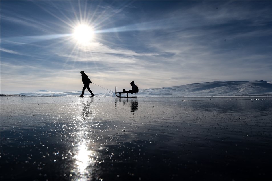 People enjoy winter at Lake Cildir